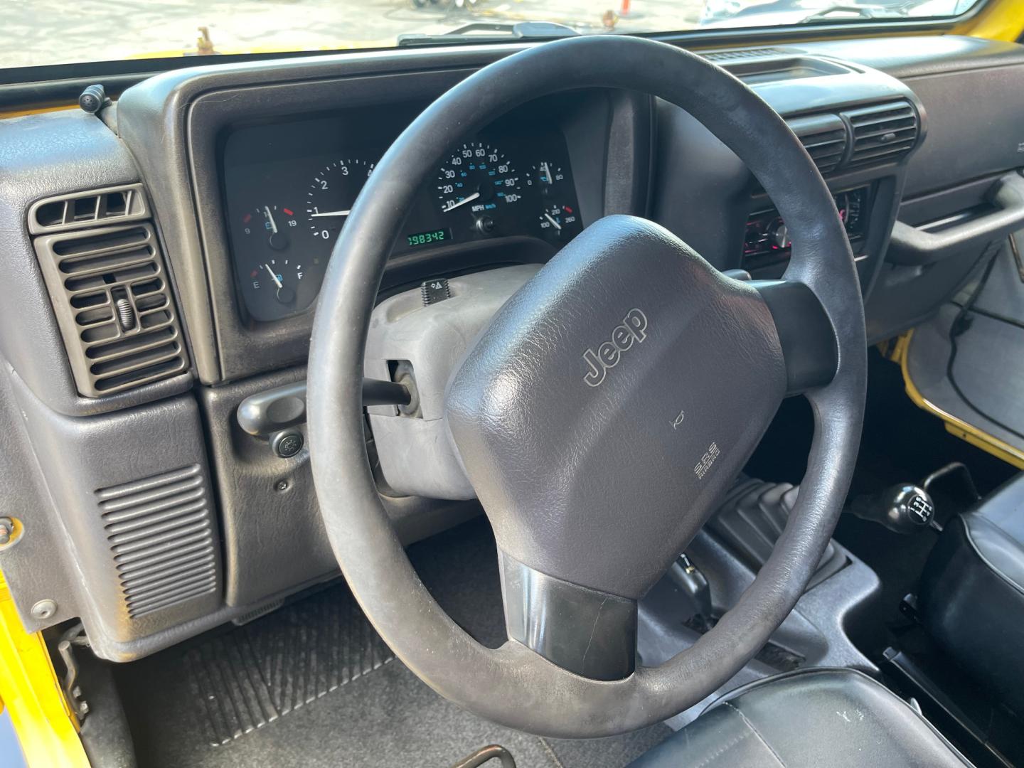 2000 Solar Yellow /Black Jeep Wrangler SE (1J4FA29P9YP) with an 2.5L 4 Cyl. engine, Manual transmission, located at 801 South State Street, Salt Lake City, UT, 84111, (801) 328-0098, 40.751953, -111.888206 - Wow extremely rare to find extra clean Jeep in immaculate condition 4x4! Low miles only 98,248 miles! Interior and exterior are both in excellent shape for the year. This is a clean title no reported accidents on the CarFax history report. It has passed emissions already and is ready to go. Featur - Photo#22